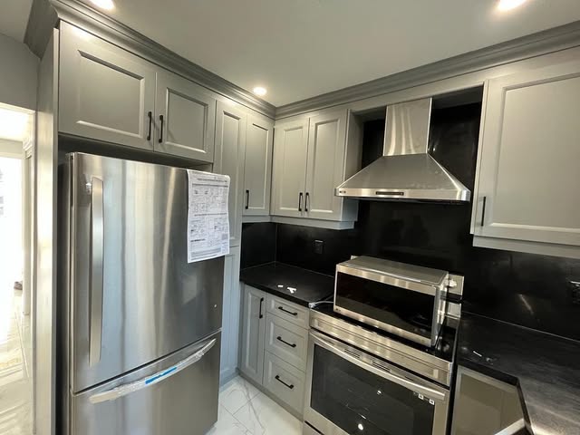 Kitchen remodel with granite countertops and custom grey cabinets, Brampton