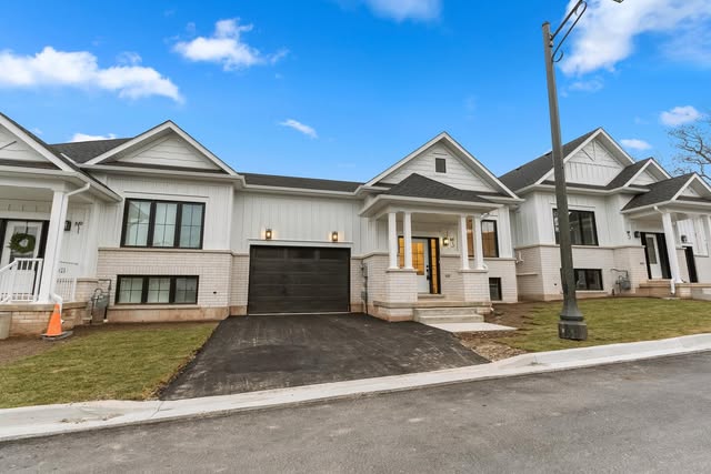 Row of newly built custom homes with completed driveways, Brampton GTA